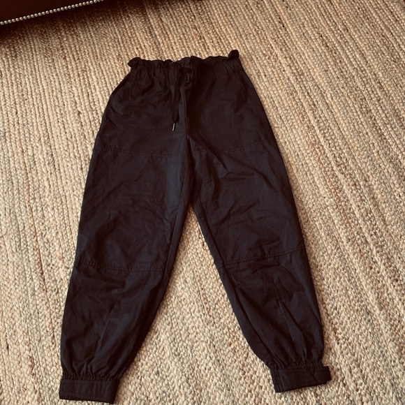 EUC
Urban outfitters high waisted women’s joggers Sz Med black drawstring close - Picture 2 of 12